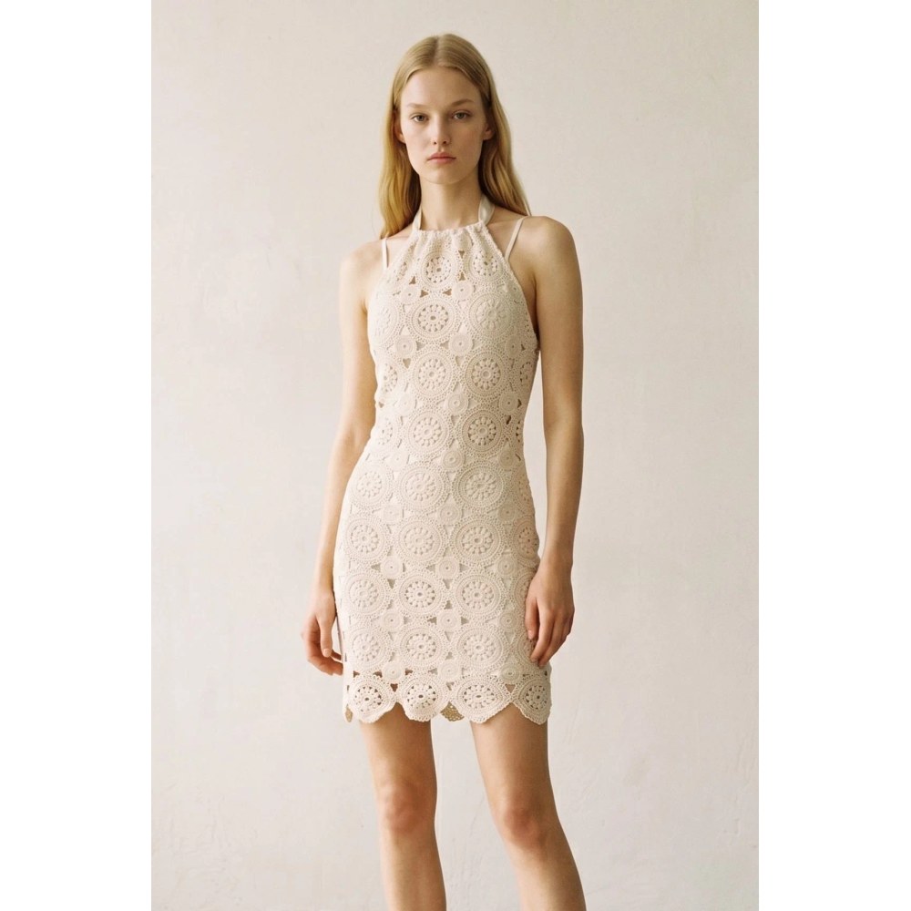 A Beautifully Crafted Crochet Maxi Skirt From The Same Collection As S7815D. The Allover Circular Floral Crochet Pattern, Mid Waist Elastic Waistband, And Scalloped Hem Create An Effortlessly Bohemian Silhouette. Lightly Lined With A Thin Lining — Slight See-Through Effect Adds To The Delicate, Feminine Charm. – Allover Circular Floral Crochet Pattern – Mid Waist With Elastic Waistband – Scalloped Hem – Lightly Lined — Slight See-Through – Stretches To Fit Fabric Content: (S7814S)
